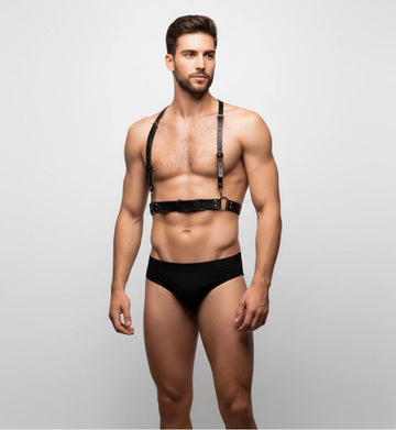 Man wearing a black faux leather bulldog harness with thin Y-back straps