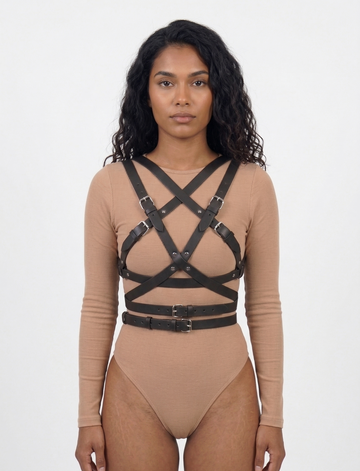 Wrap harness front view - black faux leather cross-body X-strap design with double waist belt and buckle closures