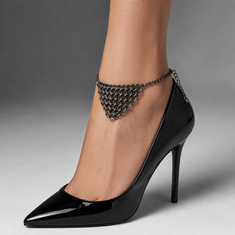 Gothic chainmail ankle bracelet - close up of the gunmetal medieval armor mesh panel on the foot