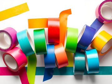 Colorful self-adhesive tape rolls for creative projects