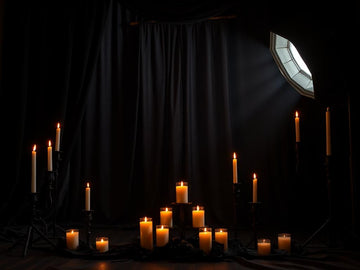 Halloween boudoir photography setup with gothic decor