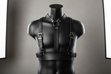 Black leather chest harness for men displayed on model