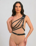 Black asymmetric one-shoulder harness with layered chest straps, front view