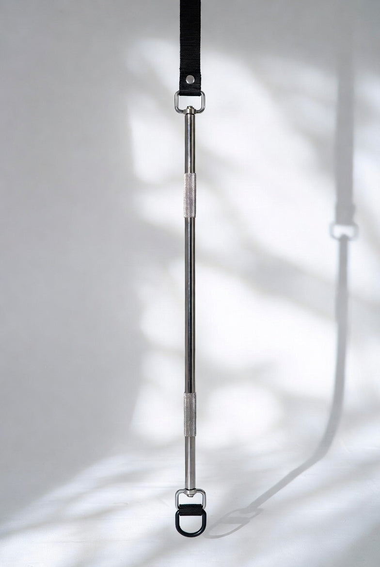 Adjustable metal spreader bar BDSM restraint with faux leather cuffs
