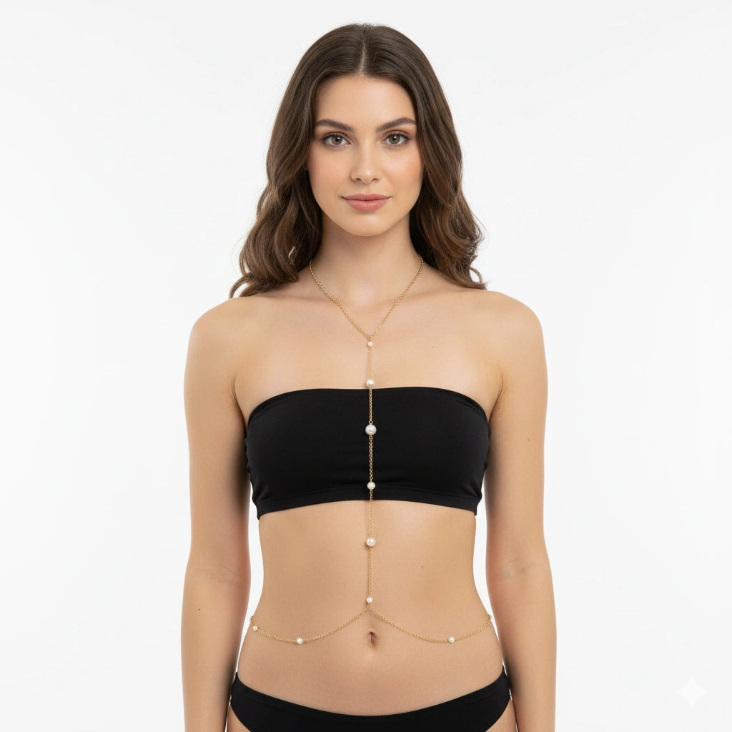 Minimal gold-tone pearl-look body chain in a Y shape from neckline to waist, front view