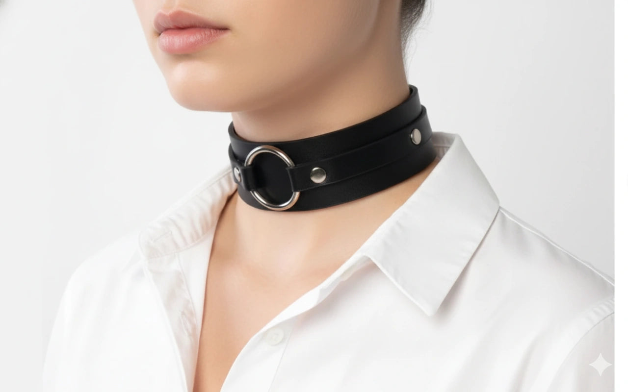Black faux leather day collar clasp and wide band detail