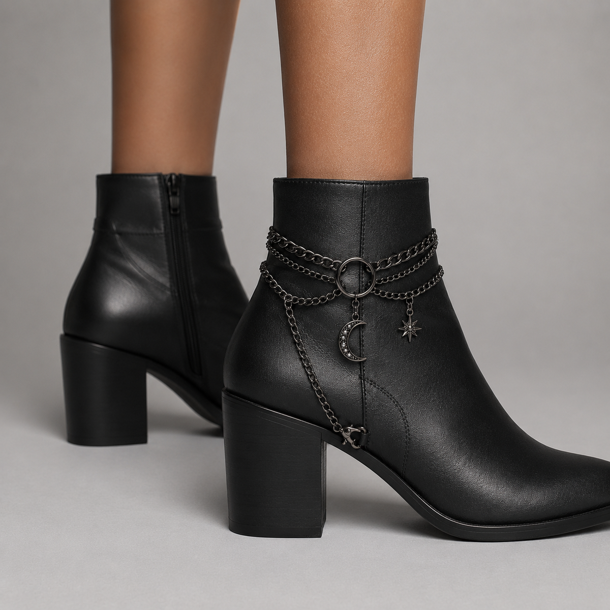 Boot chain anklet with moon and star charms on ankle boots - back view showing draped side chain