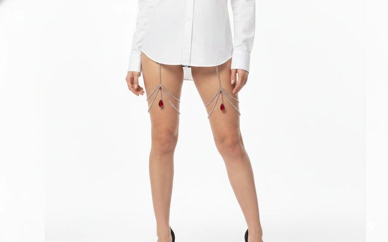 Ruby crystal thigh chain garter pair with silver-tone leg chains front view