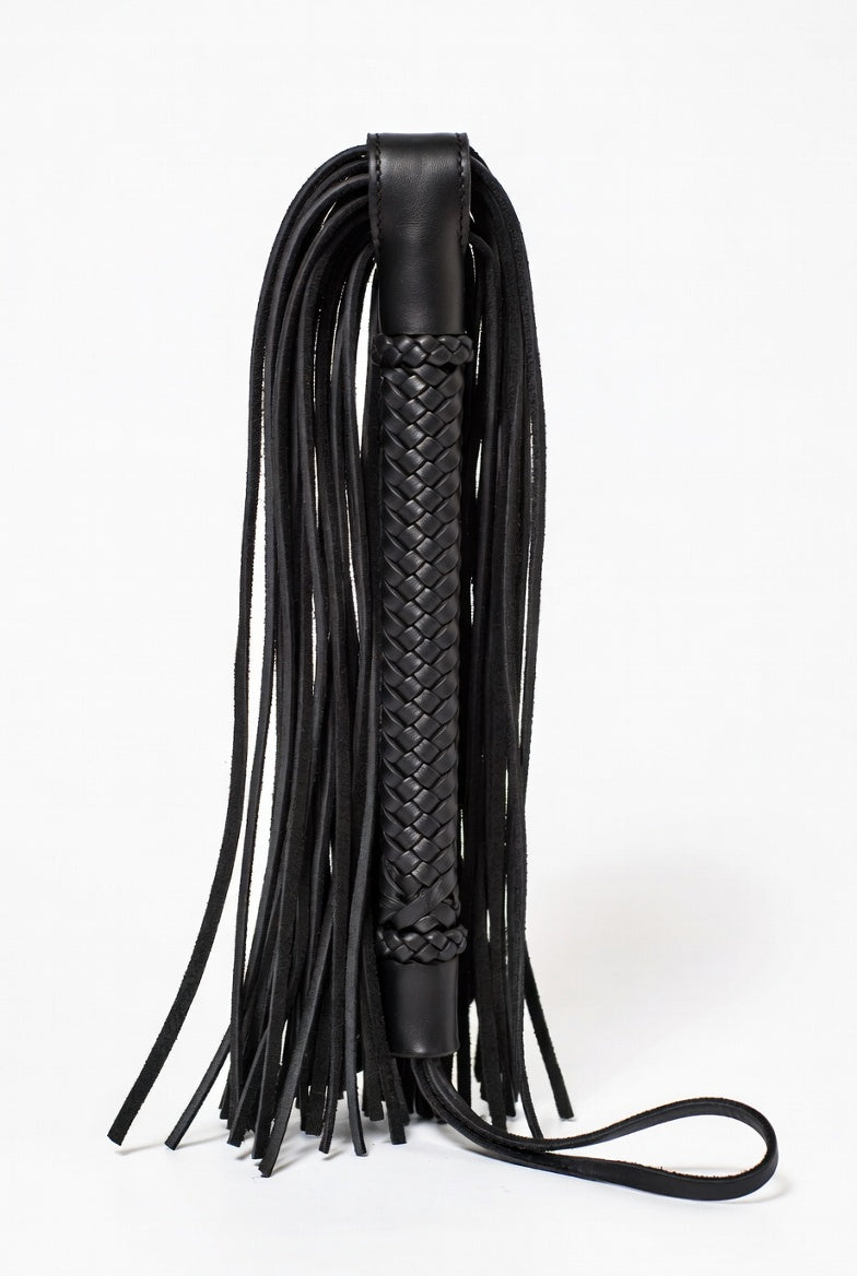 Leather flogger with suede tails for BDSM sensation play