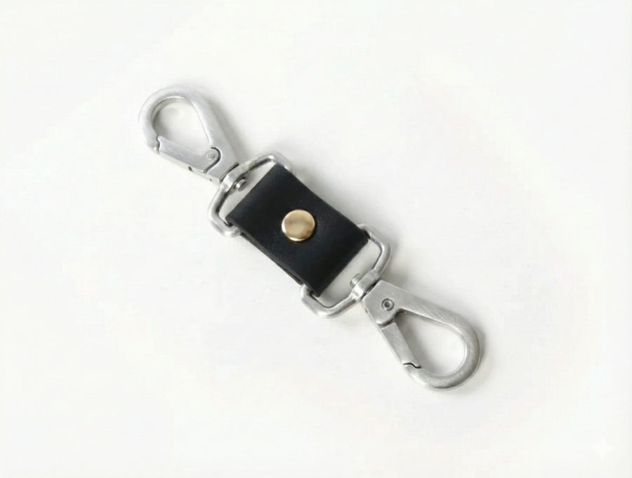 Silver-tone double-ended swivel snap connector for harnesses and cuffs