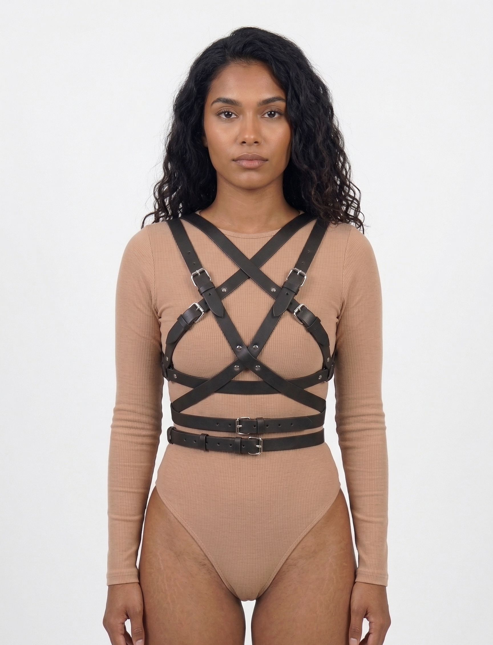 Wrap harness front view - black faux leather cross-body X-strap design with double waist belt and buckle closures