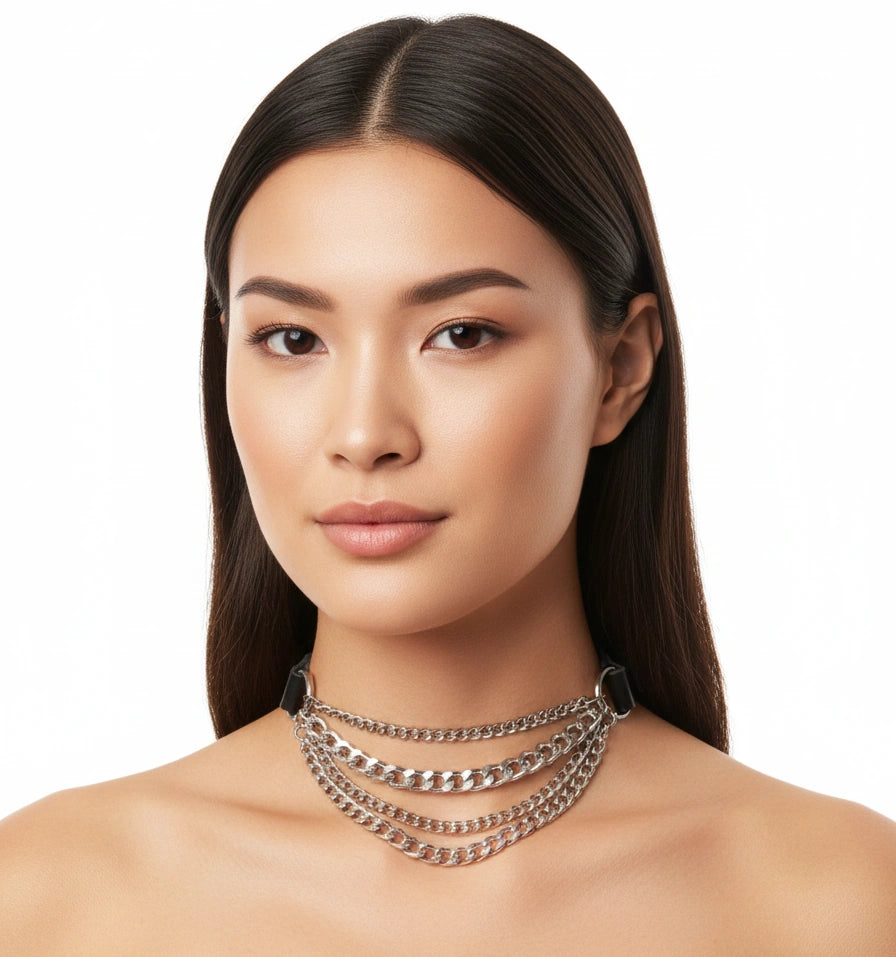 Red collar body chain with three cascading silver-tone chains, side view