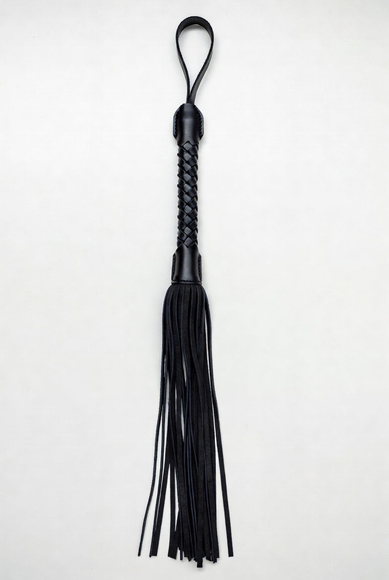 Leather flogger with suede tails for BDSM sensation play