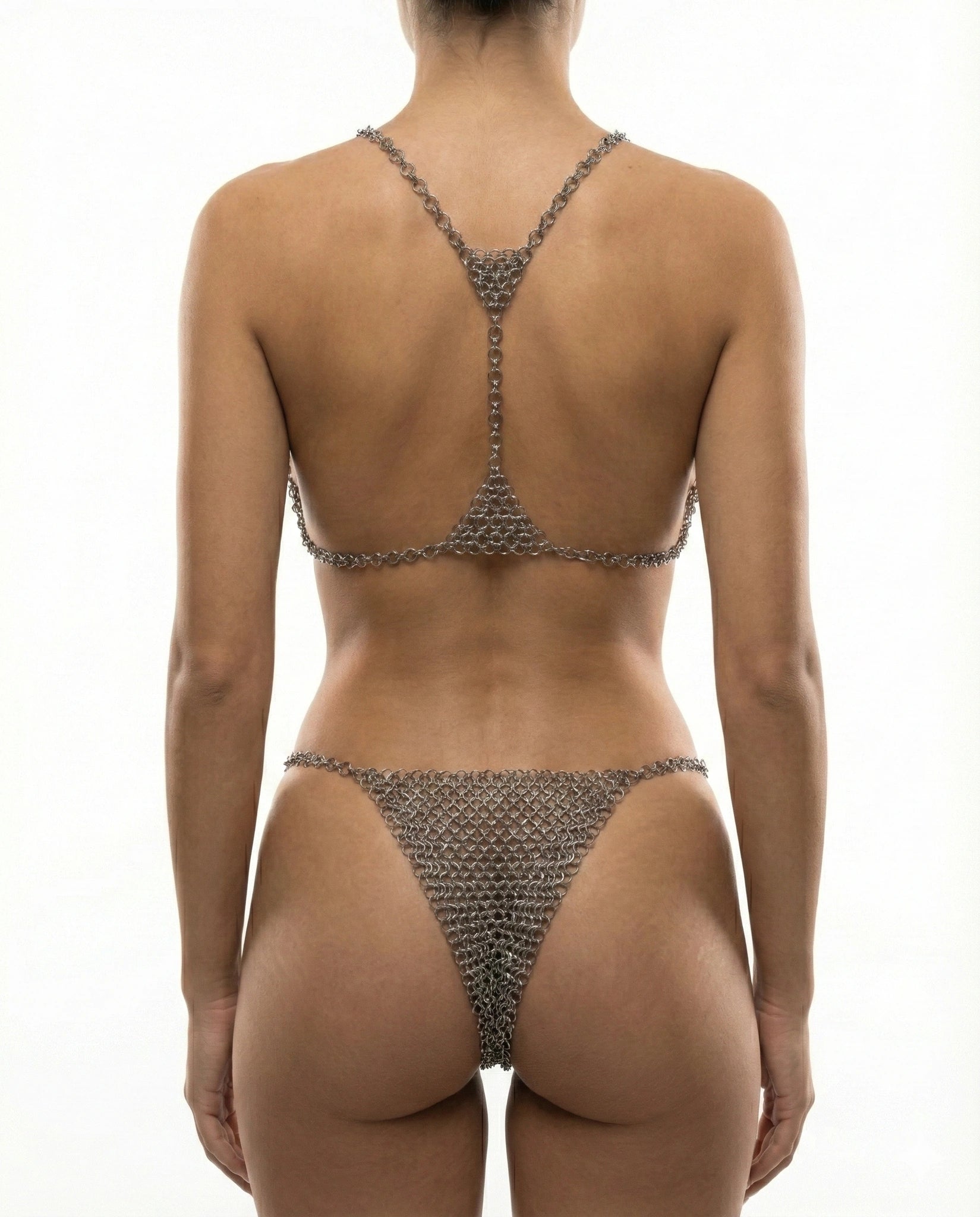 Chainmail bikini back view - Complete swimsuit set showing back chain closure, waist chain draping, and brazilian cut bottom