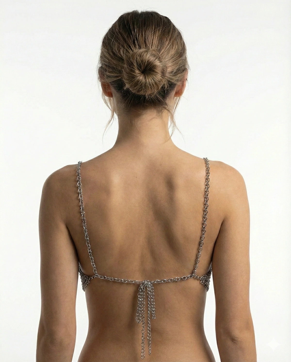 Chainmail bralette back view showing the silver halter and rear chain layout